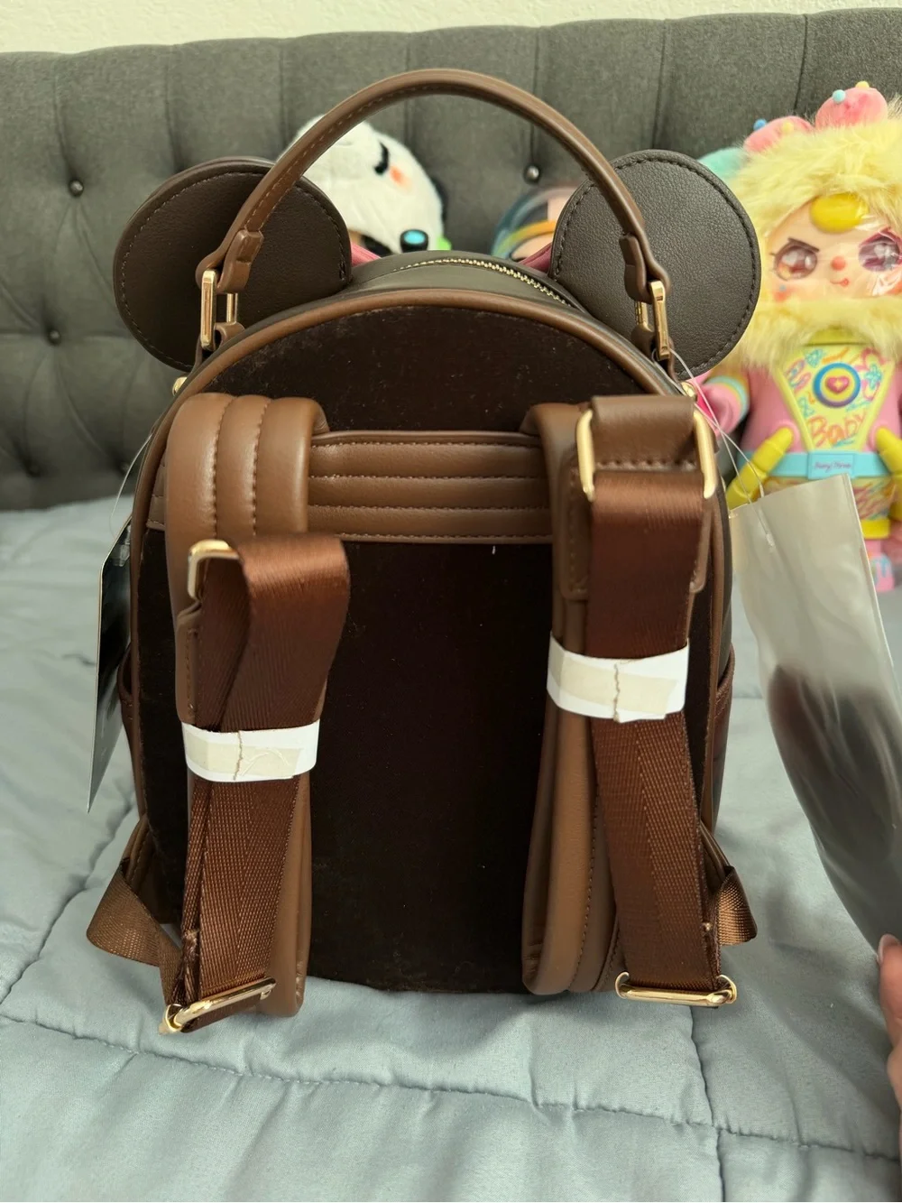 Loungefly Fall Floral Embroidered Brown Backpack with Pink Bow and applique.
